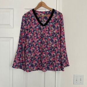Tristan bright floral blouse with bell sleeves.